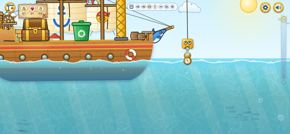 The pirate ship with a treasure chest and a bin, Haki lifts a trophy out of the sea, clownfish below.